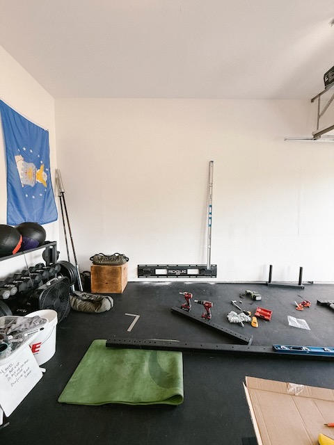 one wall stringer installed over drywall in garage